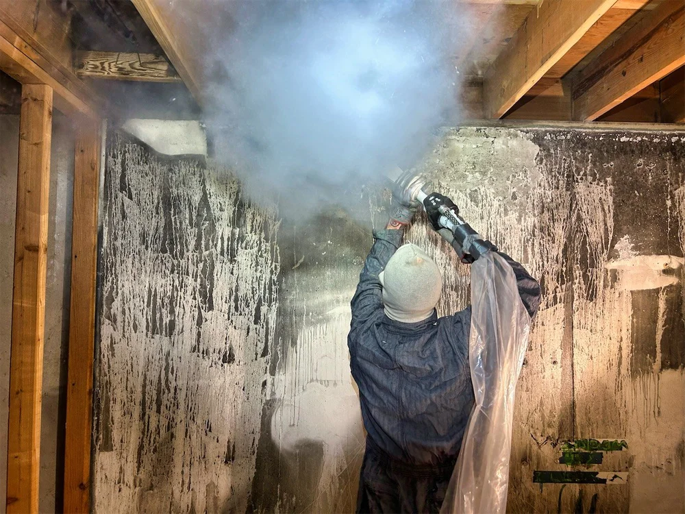 dry ice blasting by restoration technician