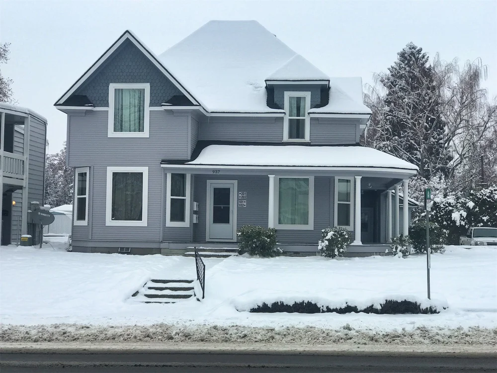 Residential home exterior before restoration services