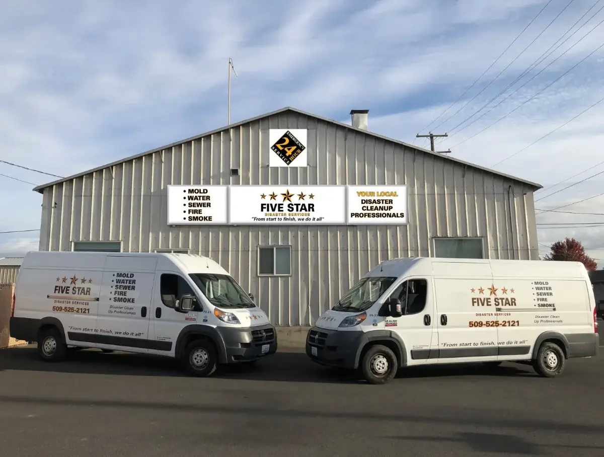 Five Star Disaster Services vans outside the Walla Walla shop